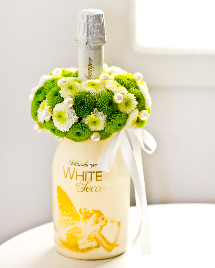 Sparkling Wine Decorated with White Flowers